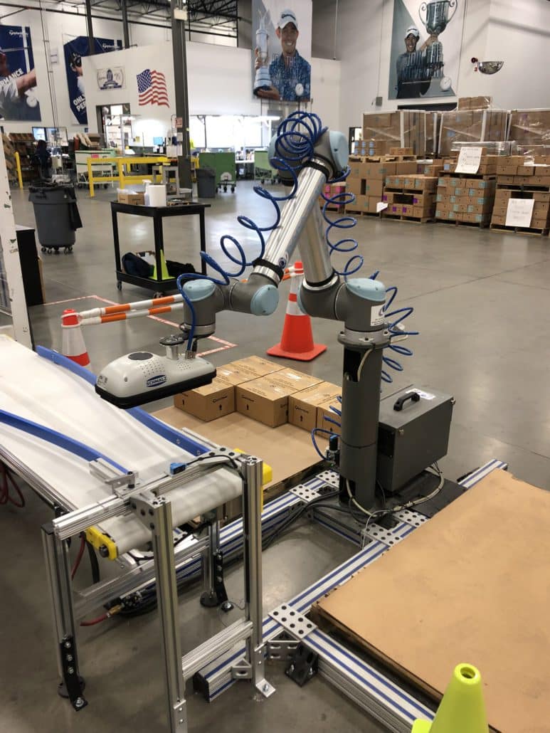 Cobot palletizing soltion at TaylorMade. RoboTemp installed by AI Automation using Pally software from Rocketfarm