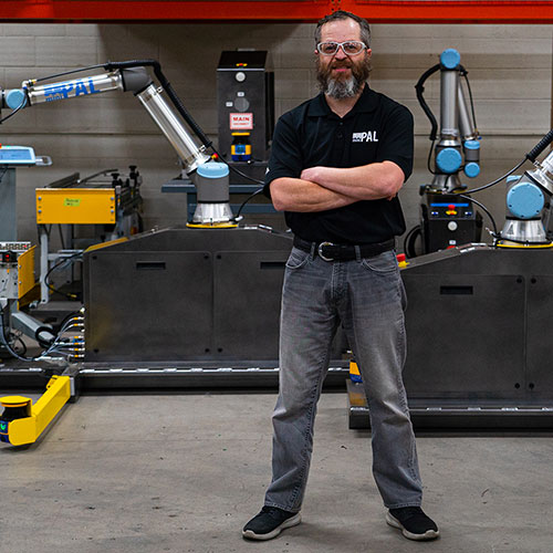 Jason Brewer together with small cobot palletizing solutions